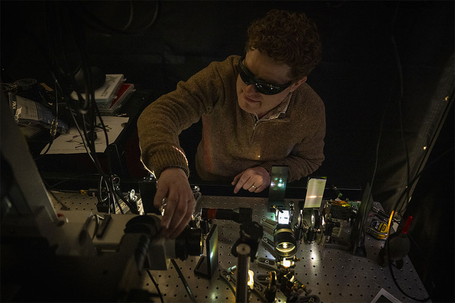Science at a work bench with a microscope.